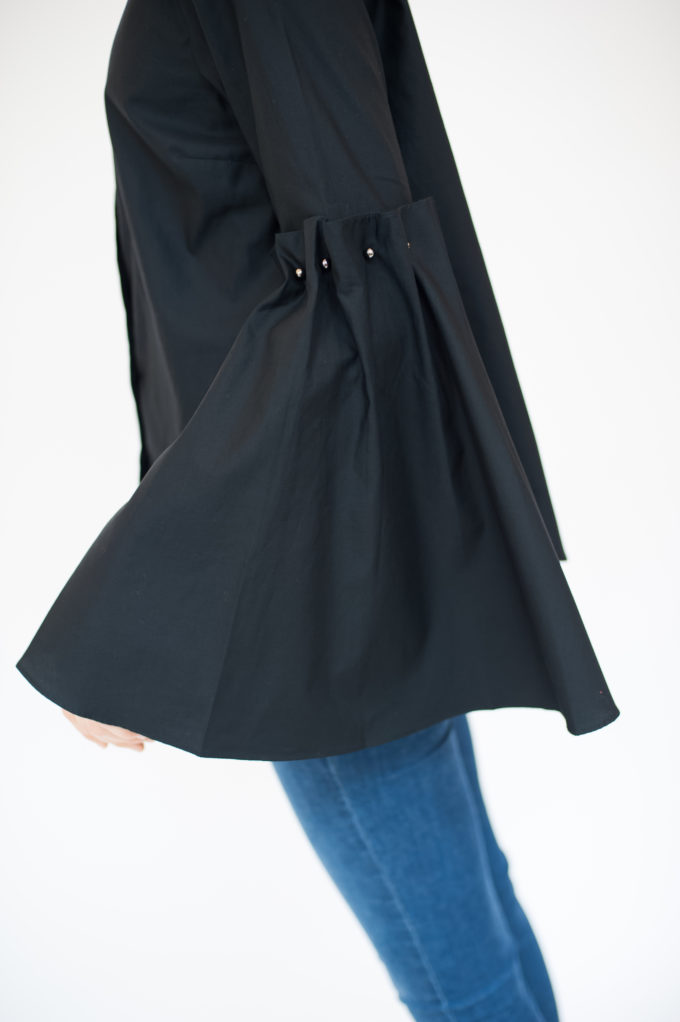 Shirt with flared sleeves